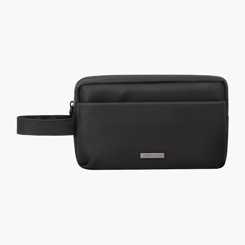 Black Nappa leather multi-functional packing pouch with wrist strap and sleek design for travel essentials.