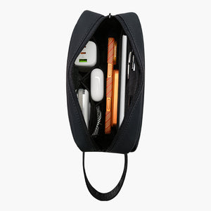 Black Nappa Multi-Functional Packing Pouch with organized compartments for tech accessories and essentials.