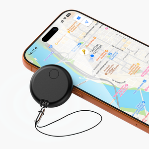 Black Taggy Bluetooth Tracker with keychain on smartphone showing map location. Compatible with Apple and Android devices.