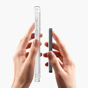Hands holding Snapgrip Clear Magnetic Strap Case for Samsung Galaxy S26 Ultra, showcasing transparent design and magnetic att