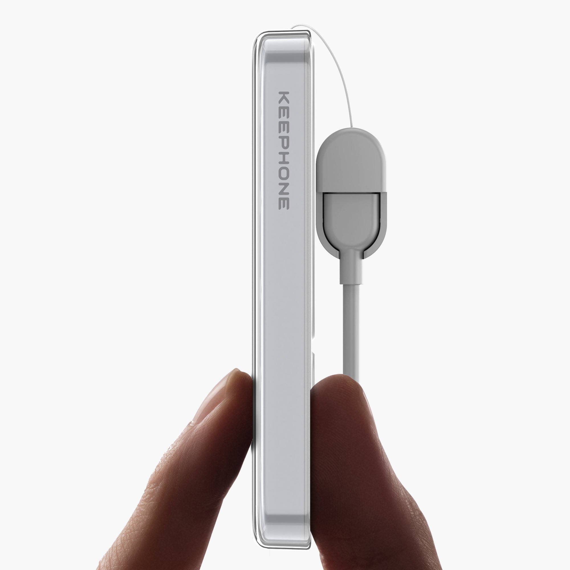 Hand holding sleek silver Icemag 5000mAh magnetic wireless power bank with attached cable, minimalist design.