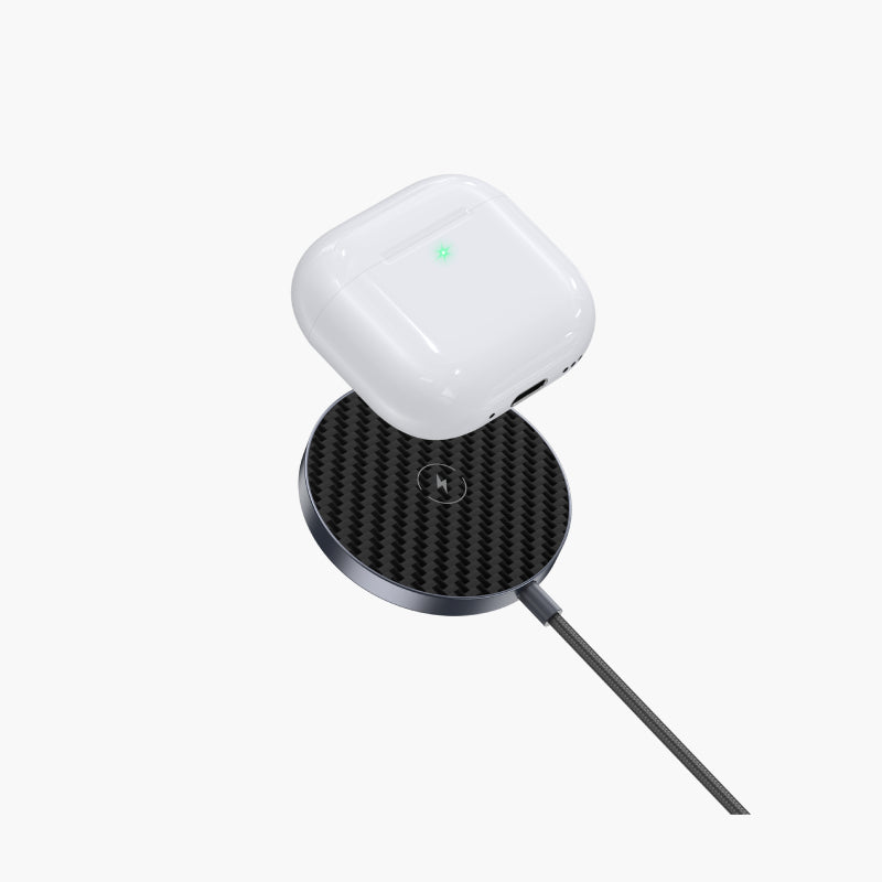 Snapad 3-in-1 Magnetic Wireless Charging Pad with MagSafe compatibility, charging AirPods on a sleek carbon fiber surface.